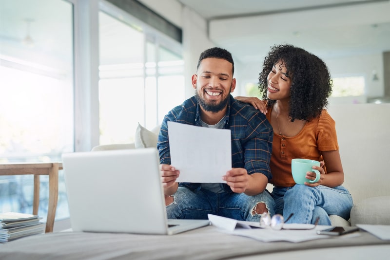 couple happy about their lower air conditioning bill